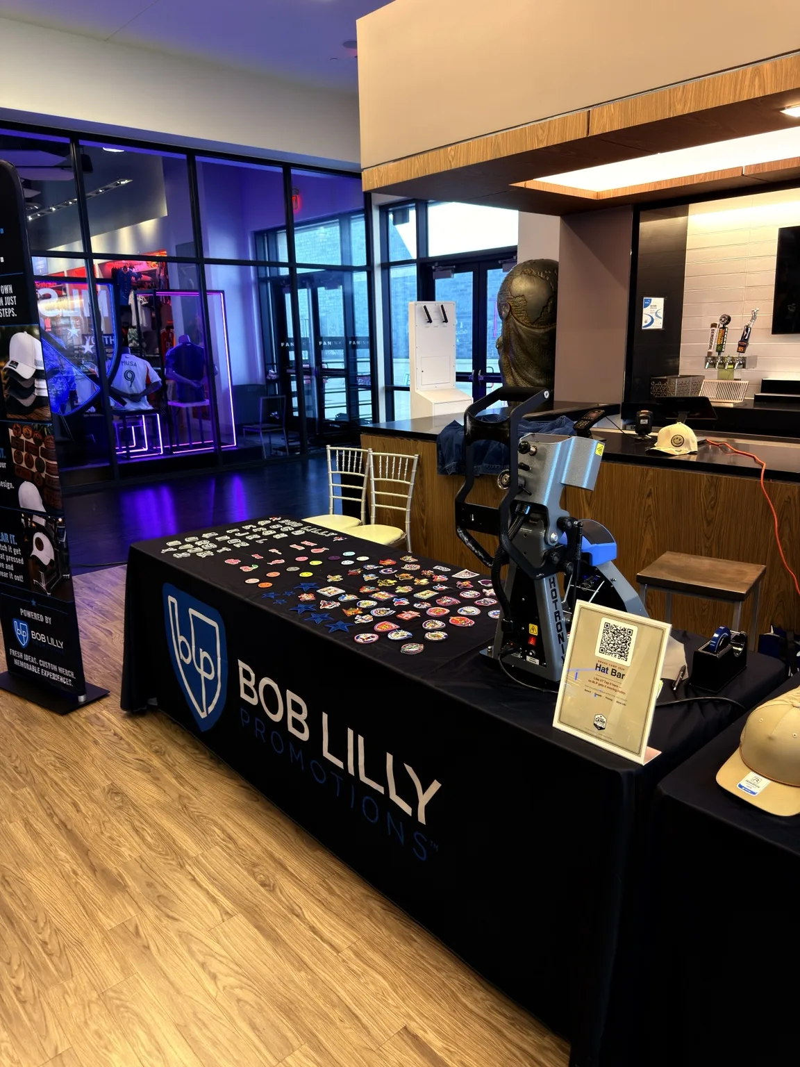 Caps, patches, and a press at the BLP Brand Camp hat bar