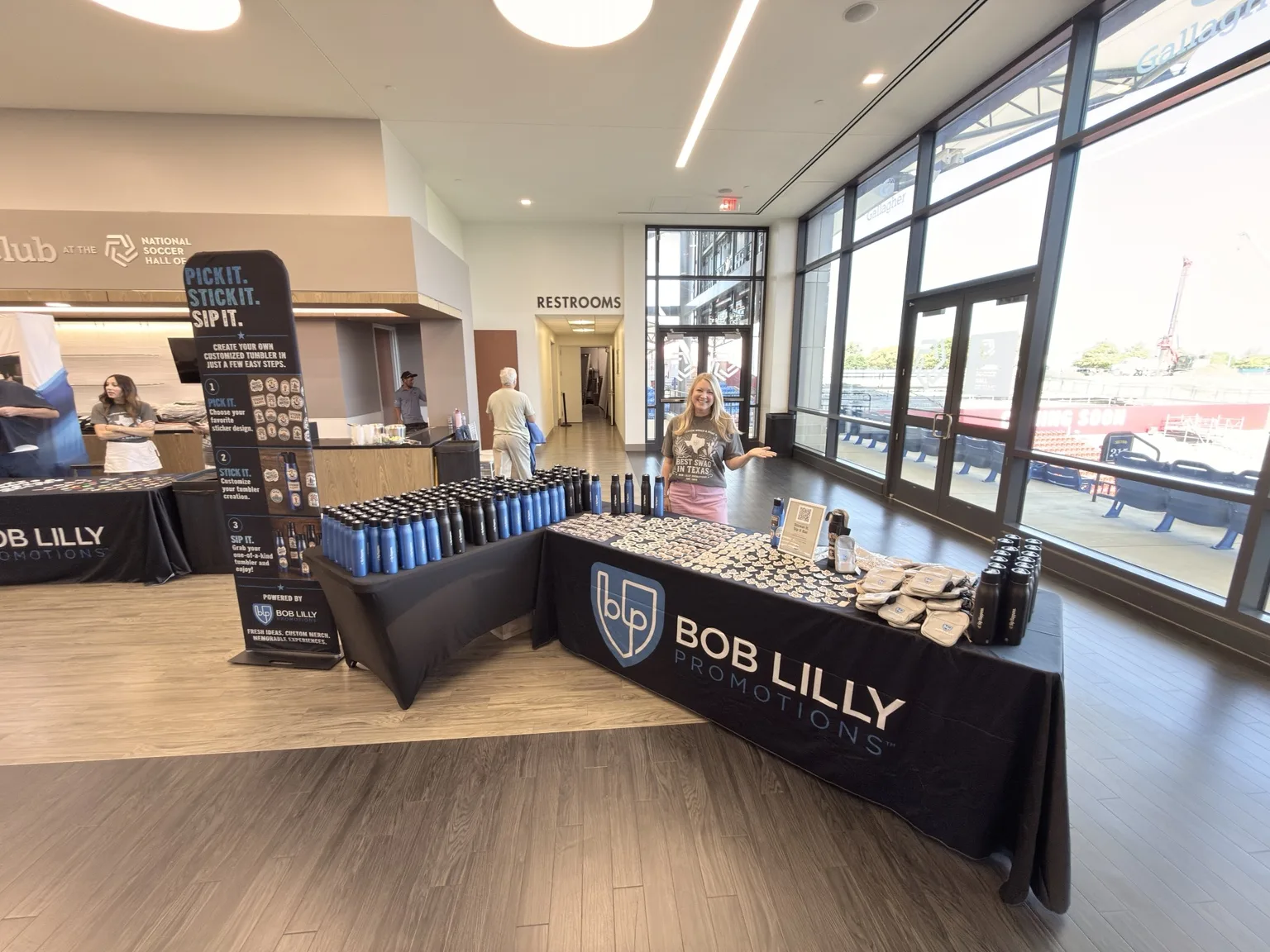 Drinkware and stickers at the BLP Brand Camp tumbler station