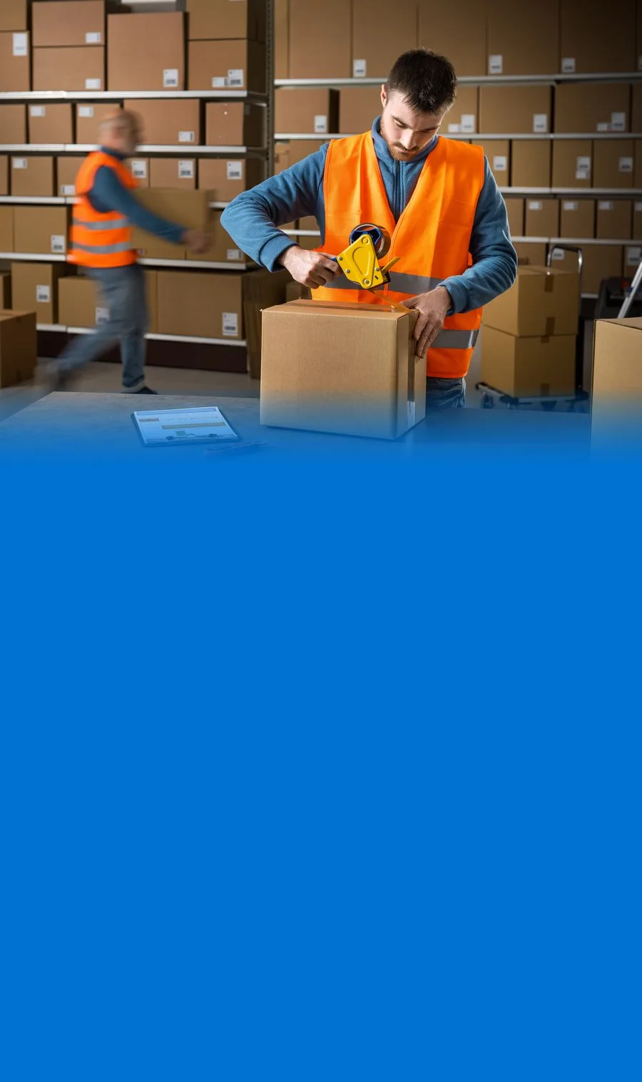 A warehouse worker taping a carton closed at Bob Lilly Promotions